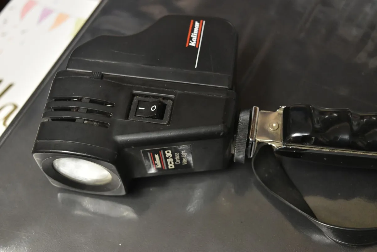 Camera Flash and Accessory Mounting Bracket - Image 1