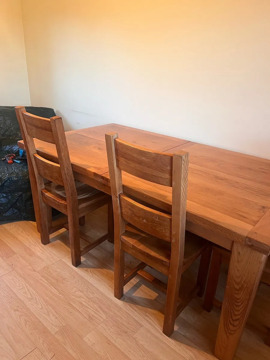 Solid wood extendable table and chairs - Image 1