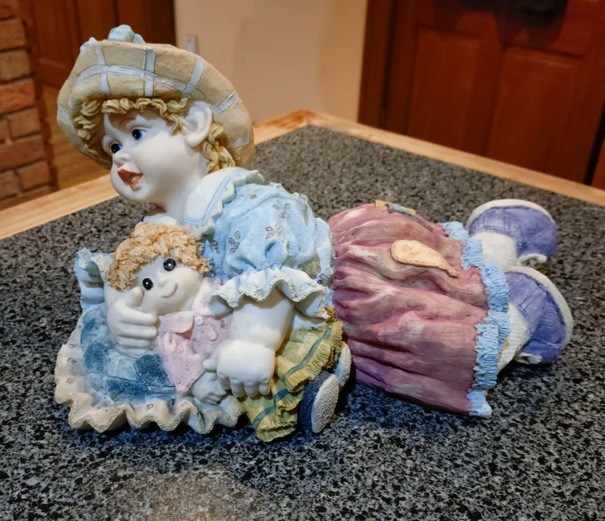 Lovely Figurine/ornament Of Child With Doll (used) - Image 1
