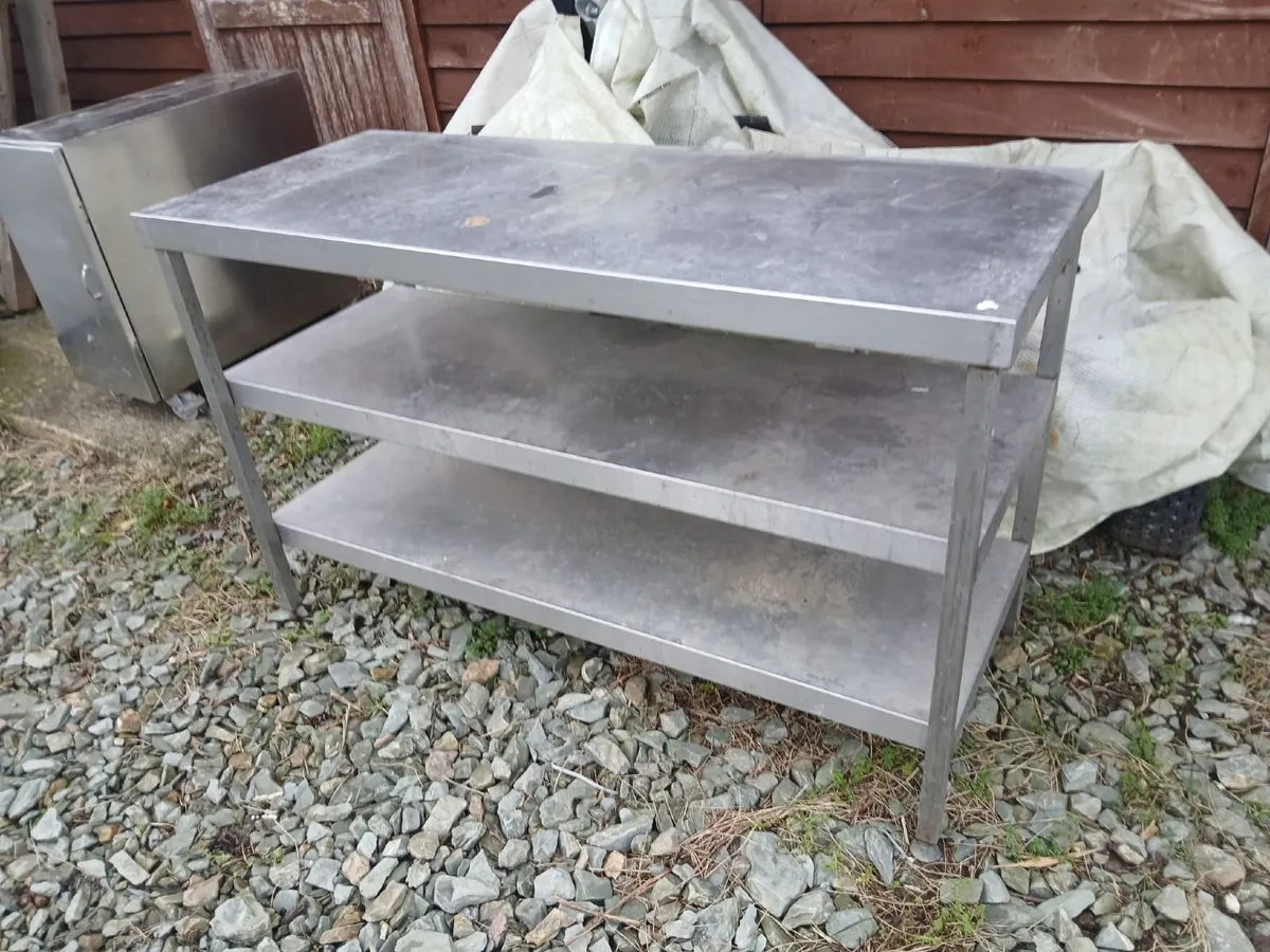 Stainless steel table and side cabinet - Image 1