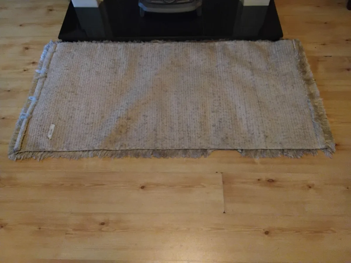 Beige house rug. - Image 2