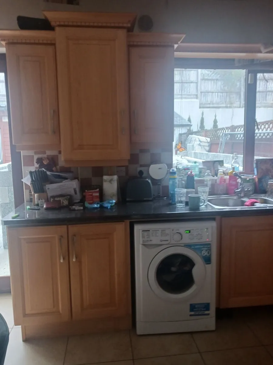 Kitchen with fridge oven and electric hob - Image 4