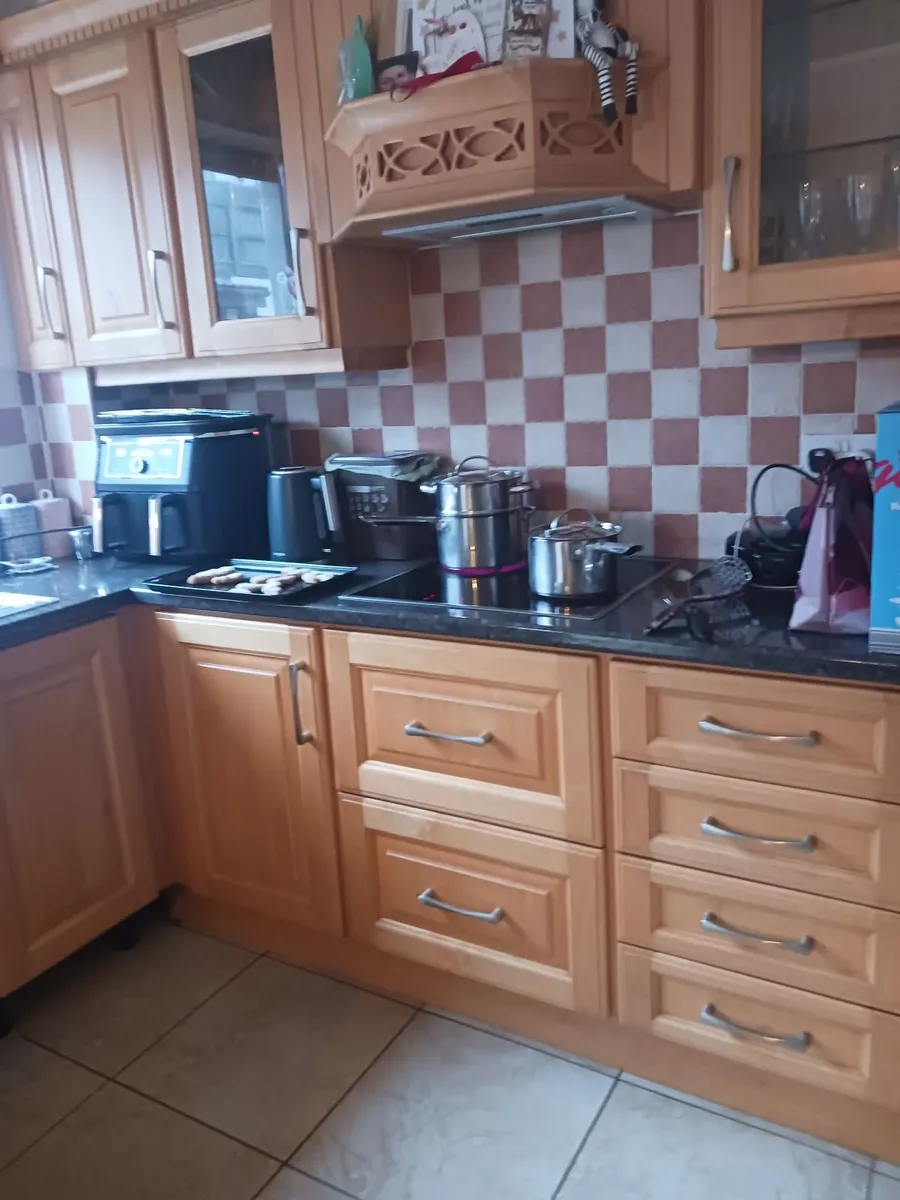 Kitchen with fridge oven and electric hob - Image 3