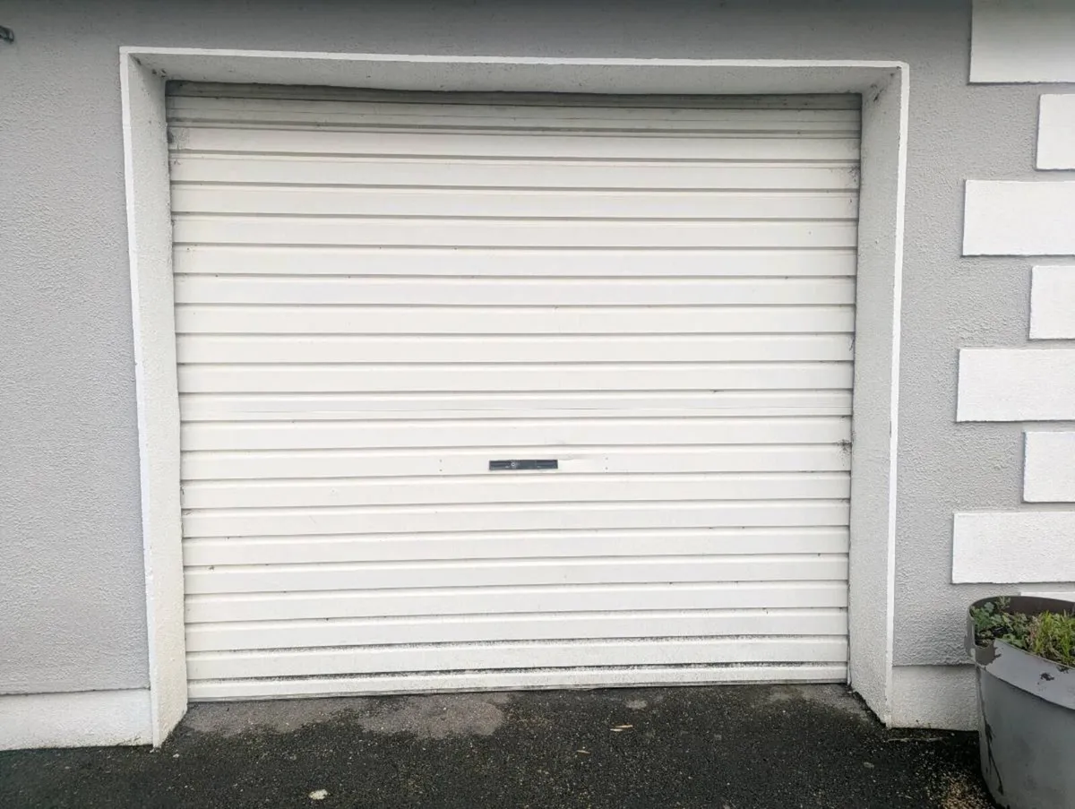 Two garage roller doors - Image 1
