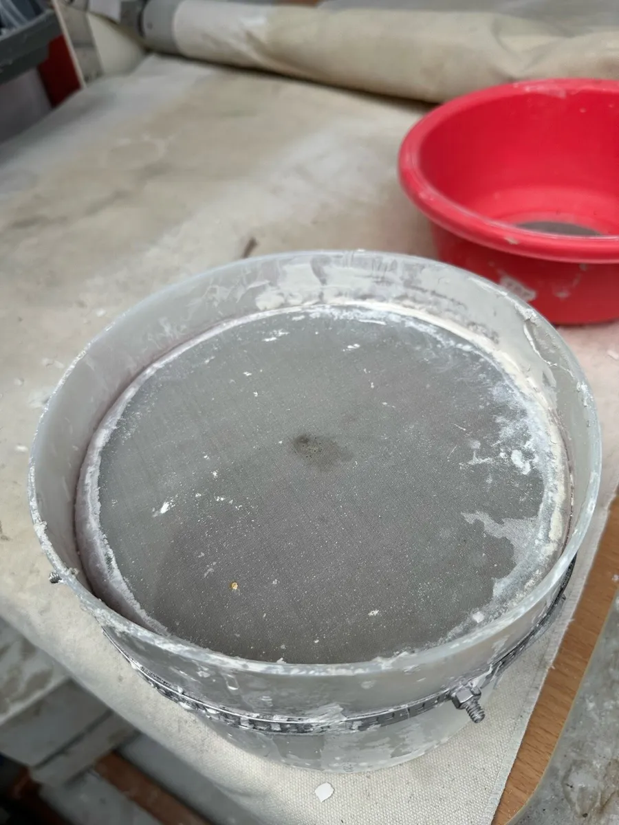 Red pottery sieve and white pottery sieve - Image 2