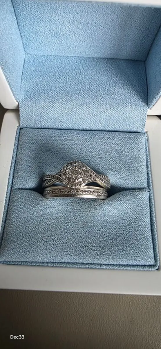 White gold engagement and wedding ring set. - Image 1