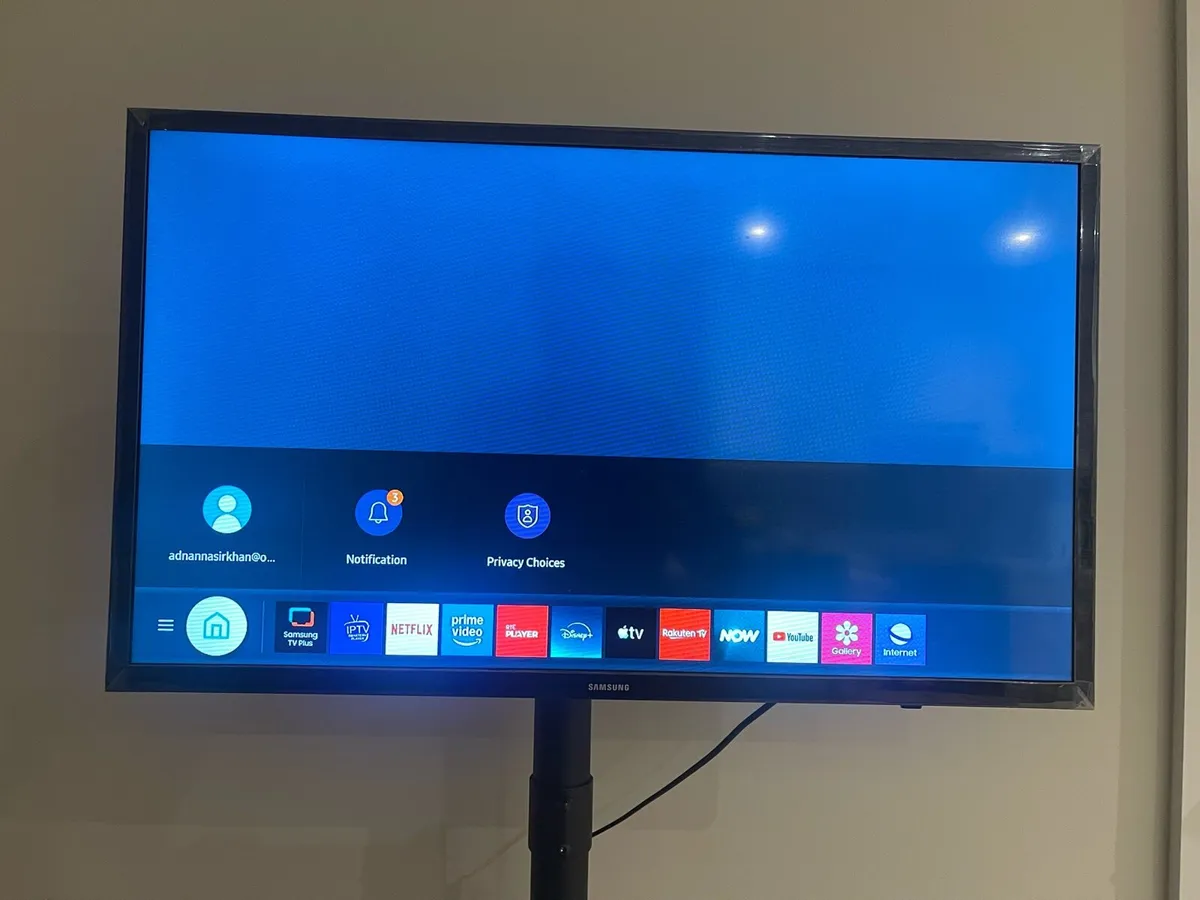 Smart TV with walking stand - Image 1