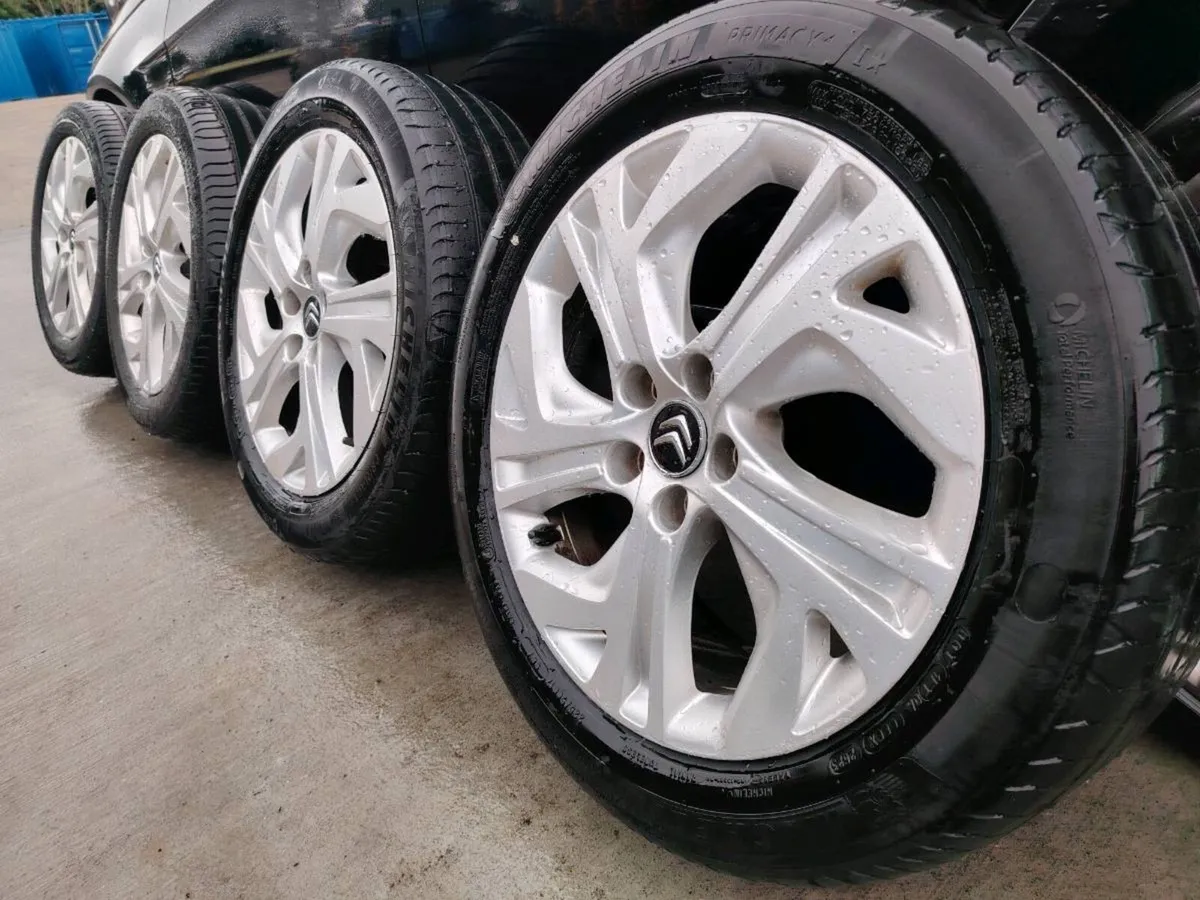 Citroen alloy wheels with Michelin tyres - Image 1
