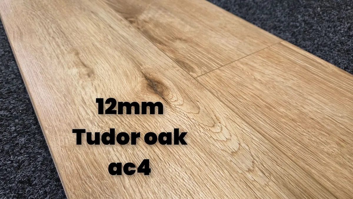 12mm laminated click flooring Delivered - Image 1
