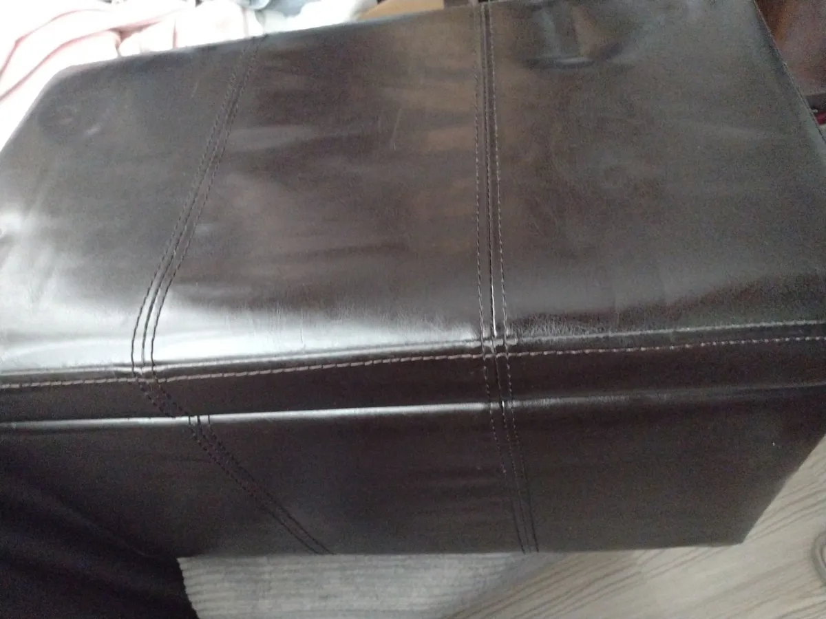 Vintage leather cushioned stool with storage - Image 1