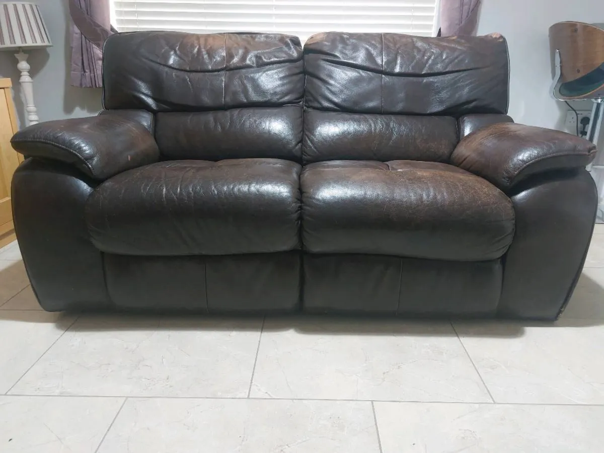 Leather Electric two seater sofa in good condition - Image 1