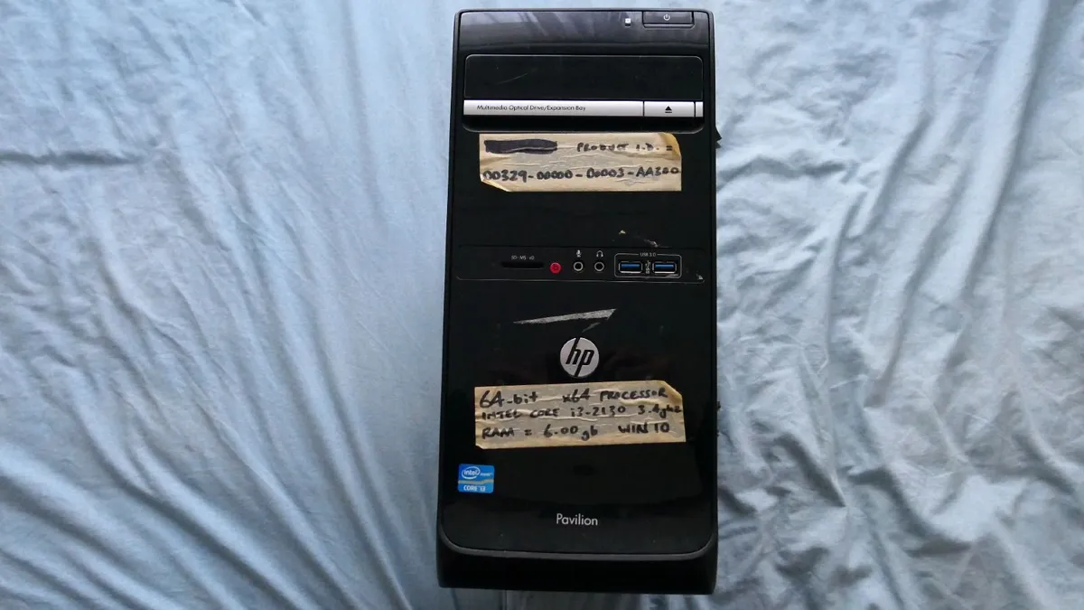 HP TOWER COMPUTER w/ keyboard + basic webcam - Image 1