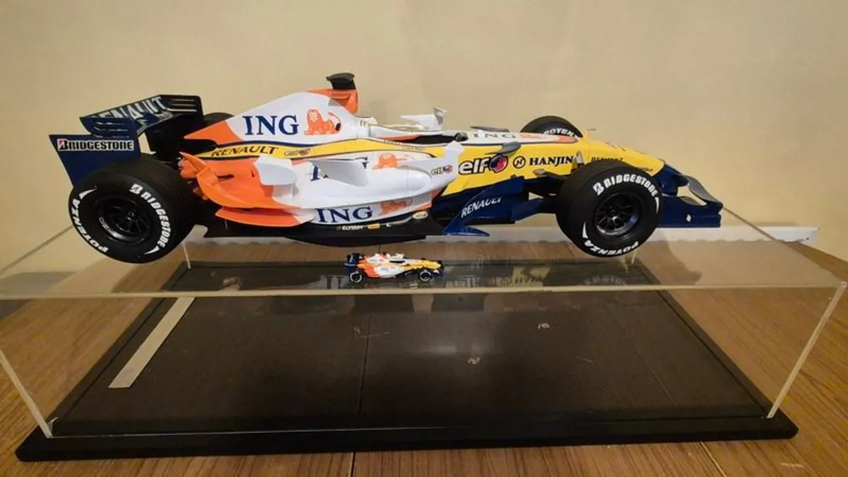 A 1:6 scale (32 inches long Formula 1 car) limited edition model of the 2007 Season ING Renault R27 F1 Team car - Image 1