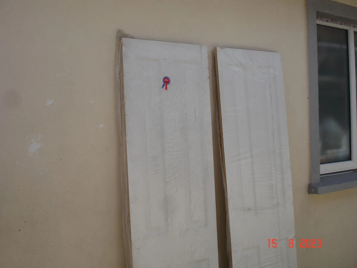 Doors pair .  New ,      O/A    1058 mm .