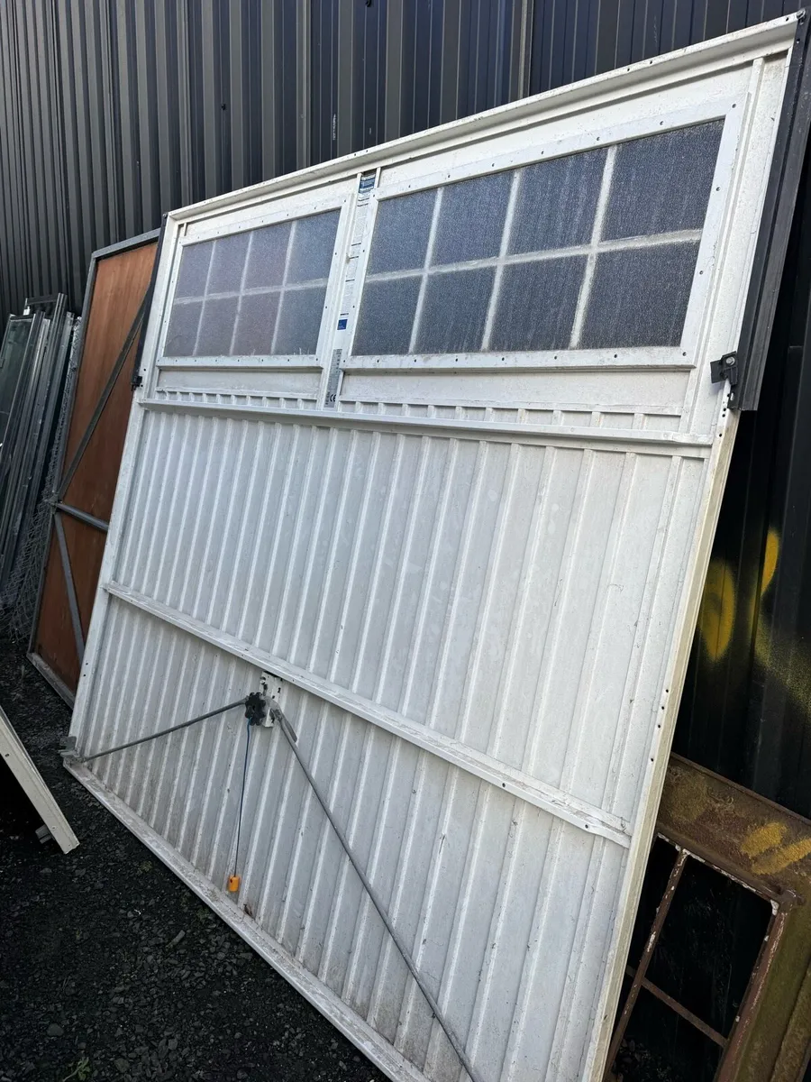 2 used electric garage doors - Image 2
