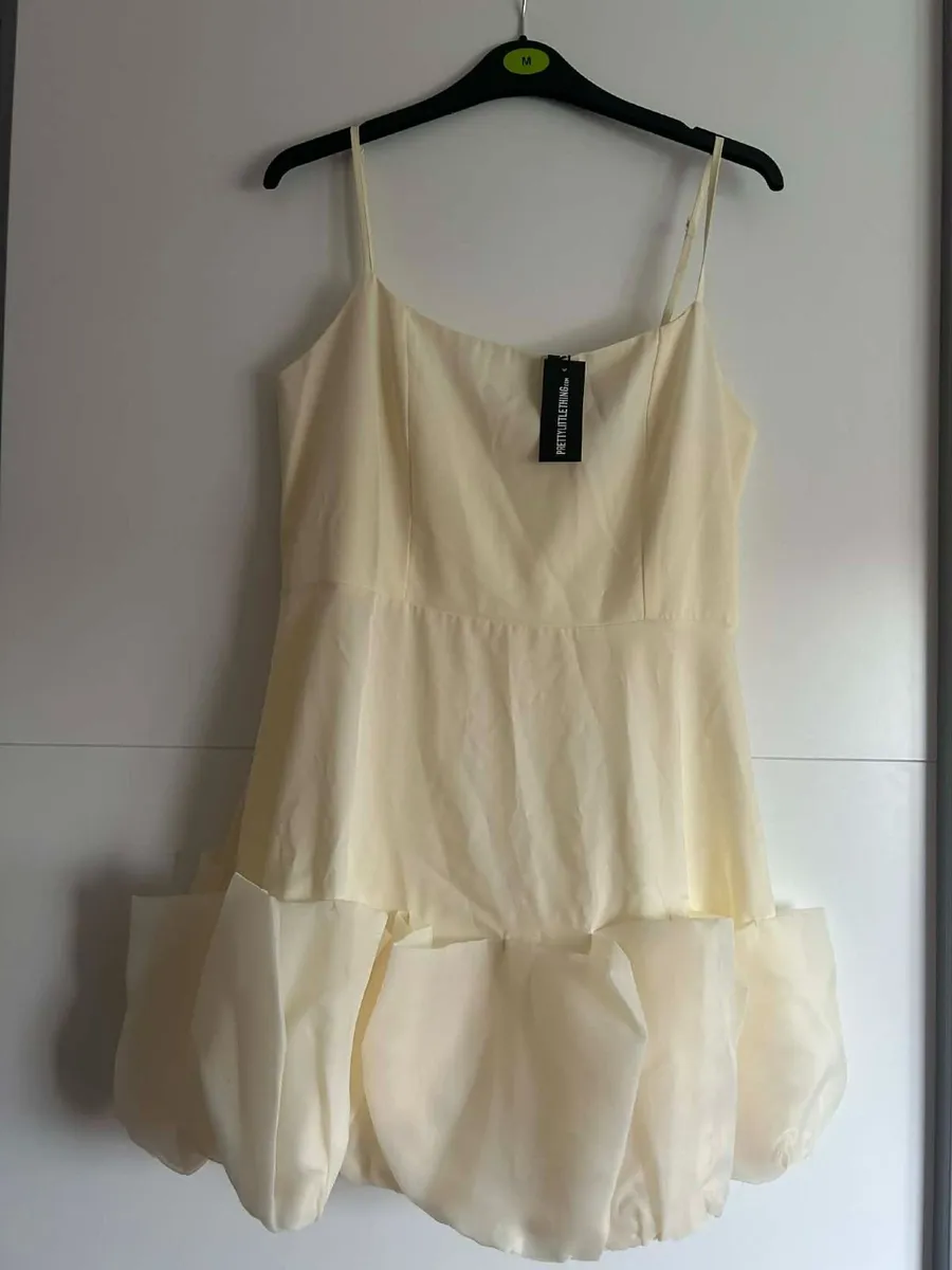 2dresses and earrings - Image 1