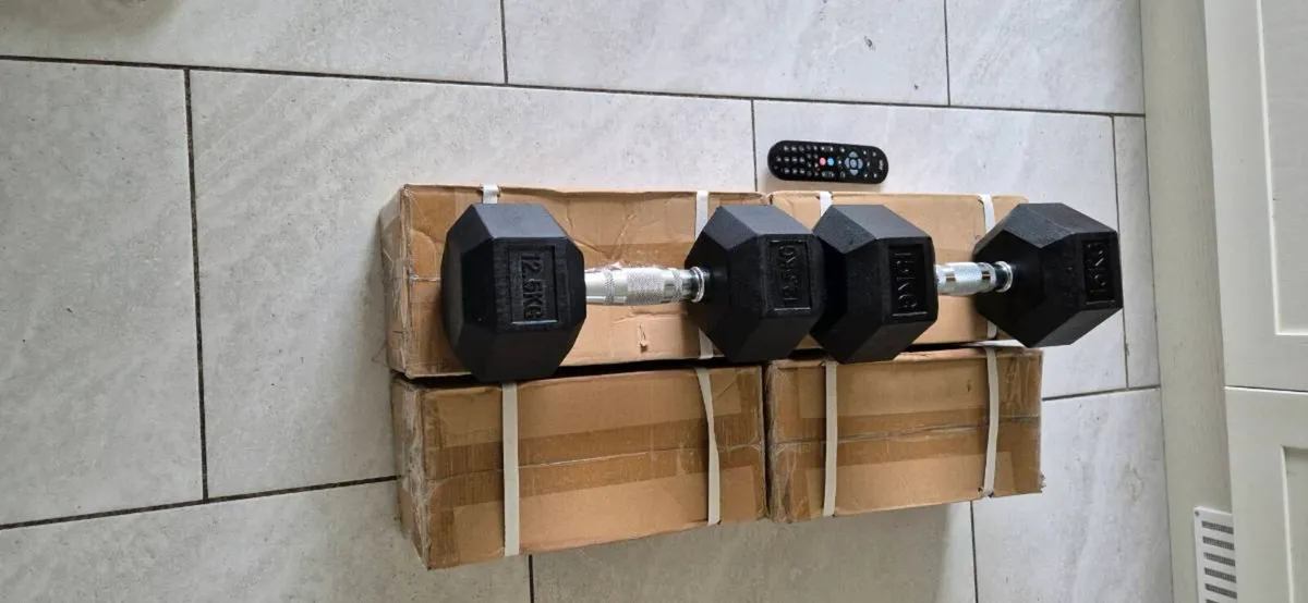 2xbrand new sets of dumbbells ,2x12.5kg, 2x15kg - Image 1