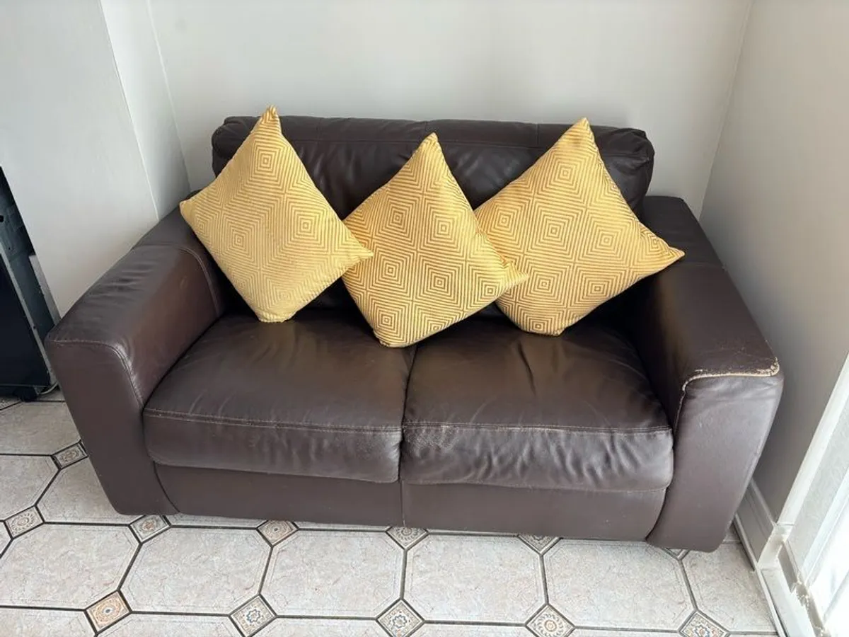 Compact 2 seater brown leather sofa - Image 1