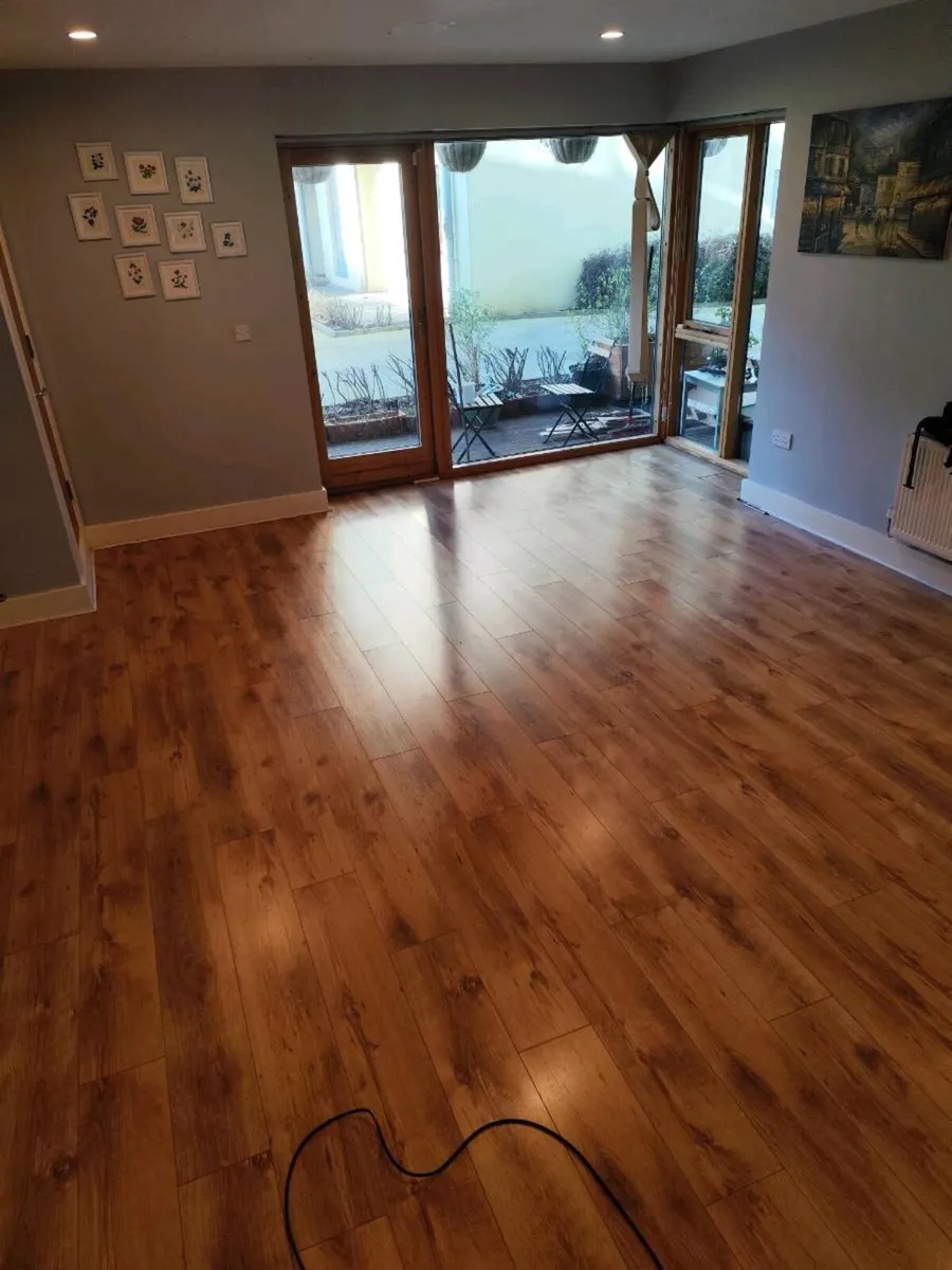 Used 8mm laminate flooring - Image 1