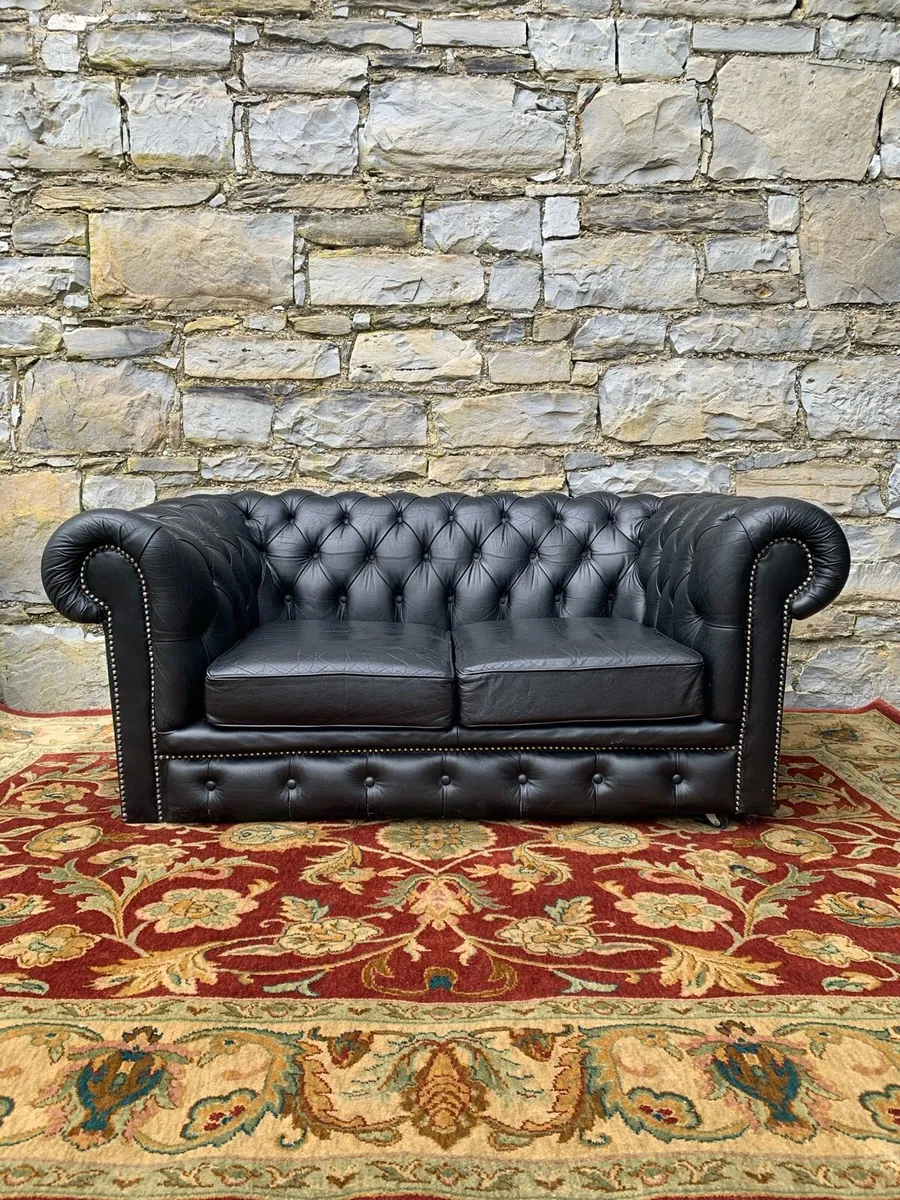 Black leather Chesterfield 2 seater sofa. - Image 1