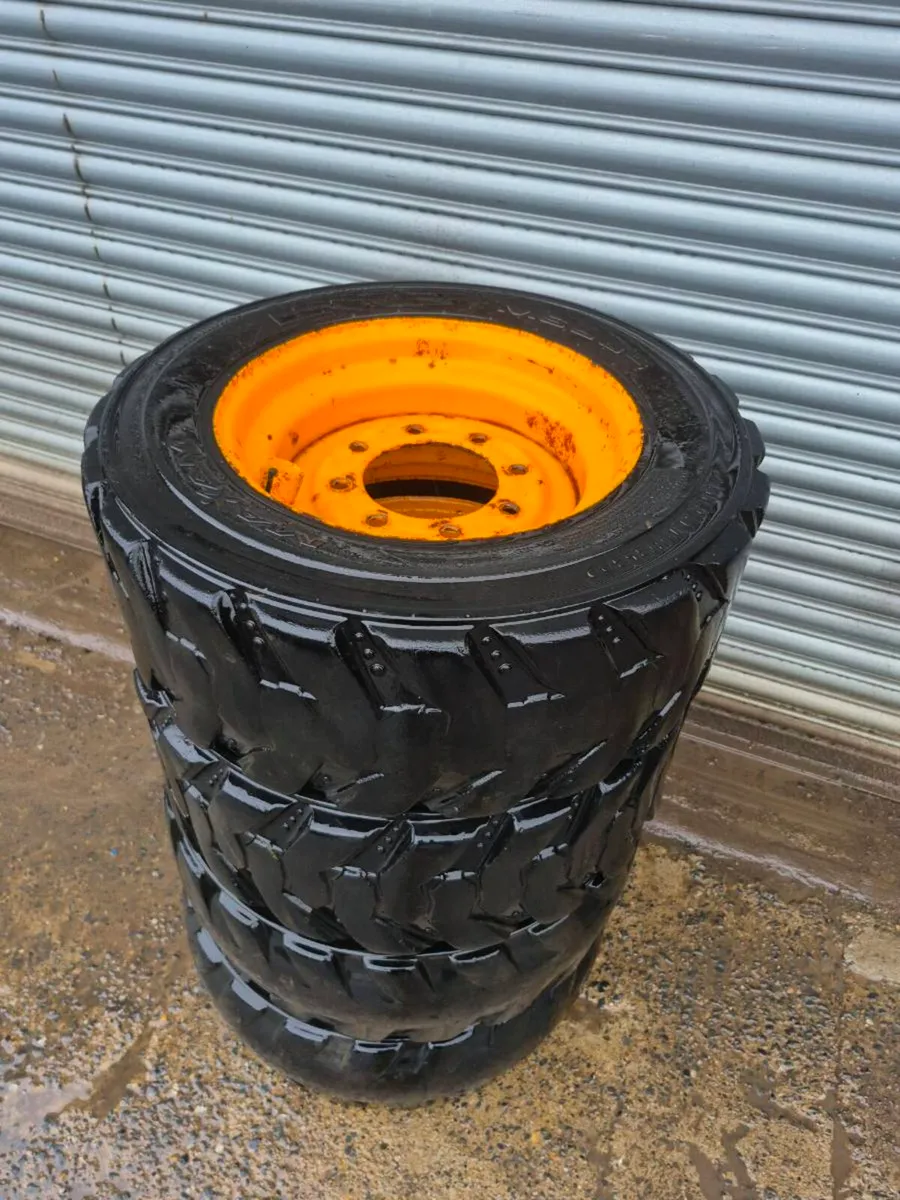 8 stud skid steer wheels .. + Rubber Tracks - Image 1
