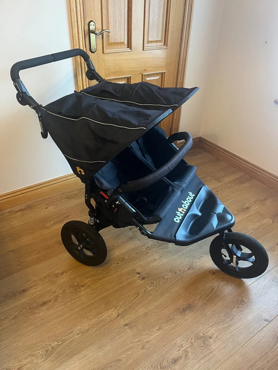 Outnabout black double pram - Image 1