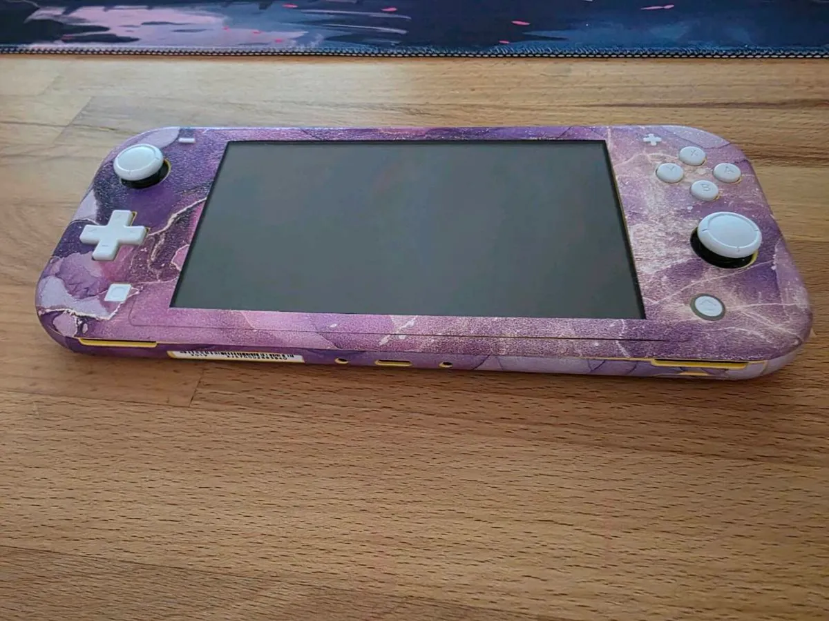 Nintendo Switch Lite Excellent Condition - Image 1