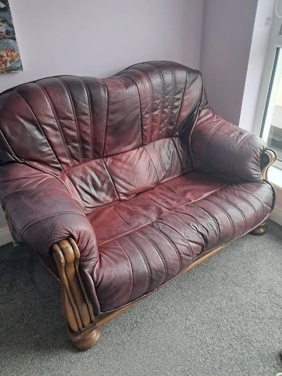 Maroon leather couch - Image 1
