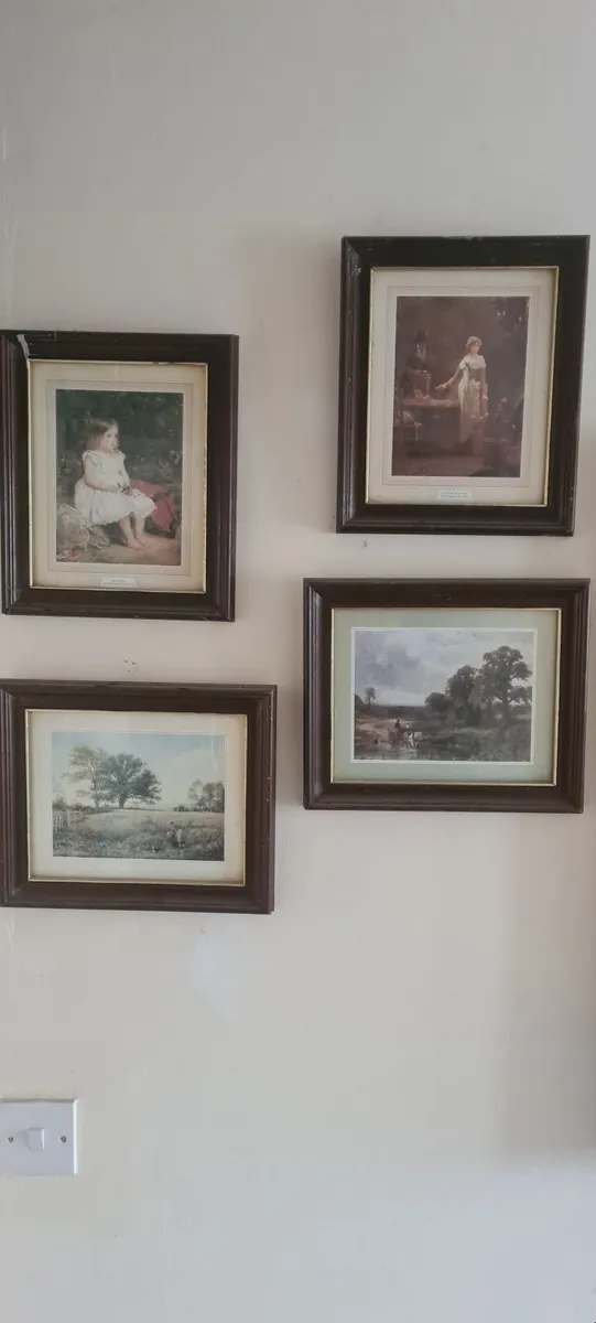 Old World pictures in frames with glass