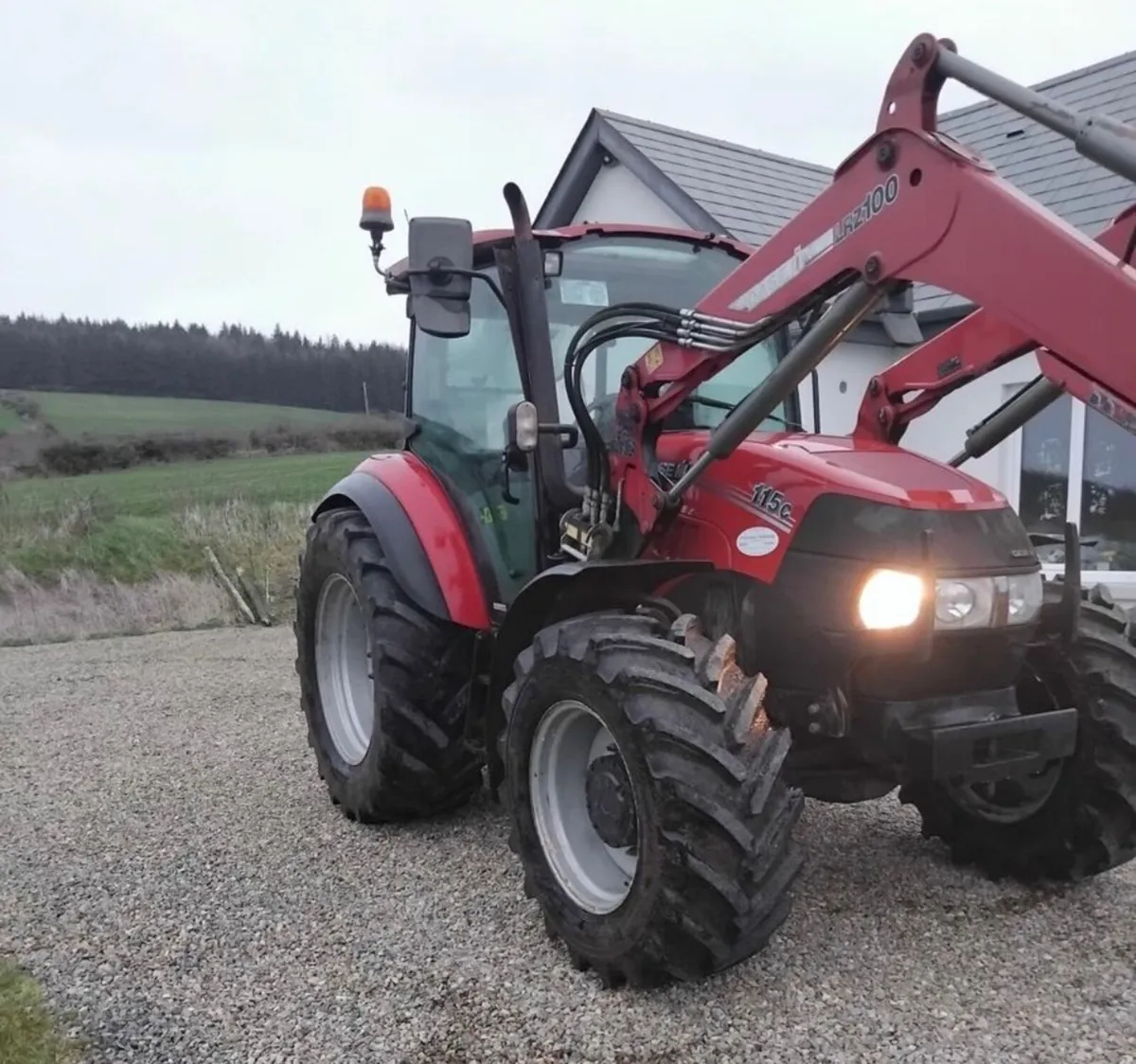 2018 Case Farmall 115C and loader - Image 1