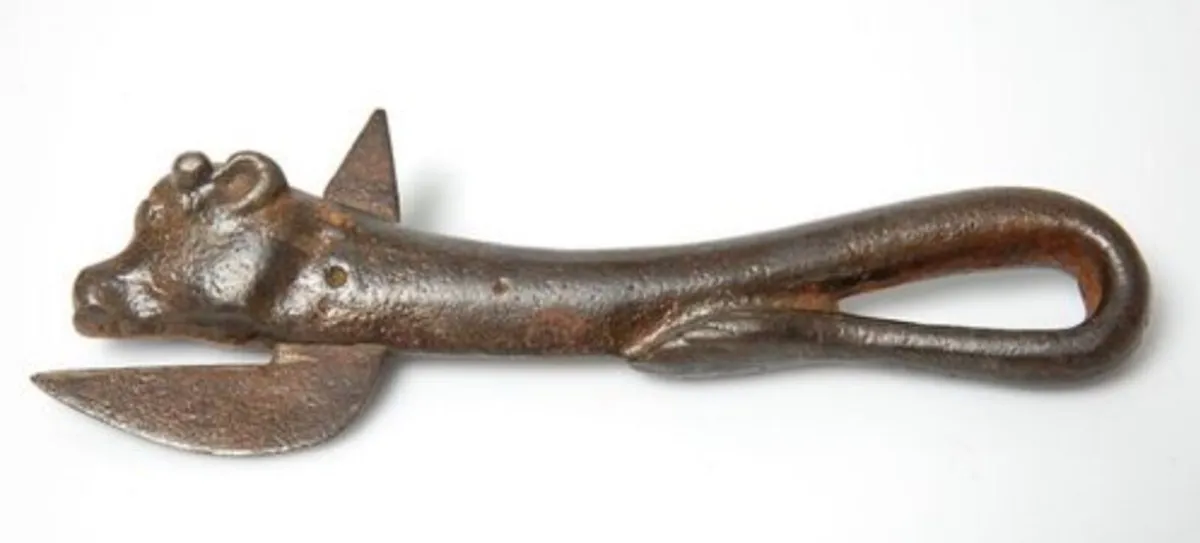 Antique cast iron bull head can opener