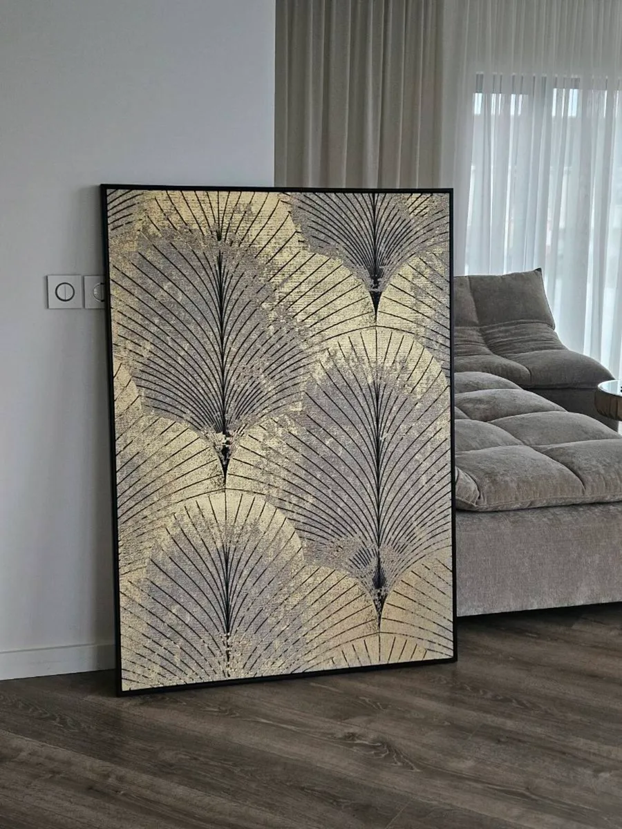 Large gold print with black frame. - Image 1