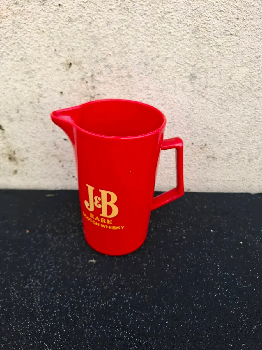 JB plastic whiskey pitcher