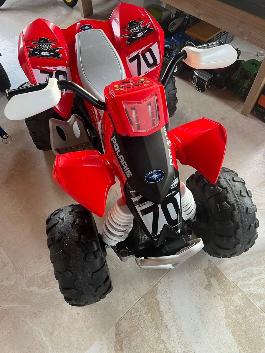 Peg Perego Red 330W Quad - Image 1