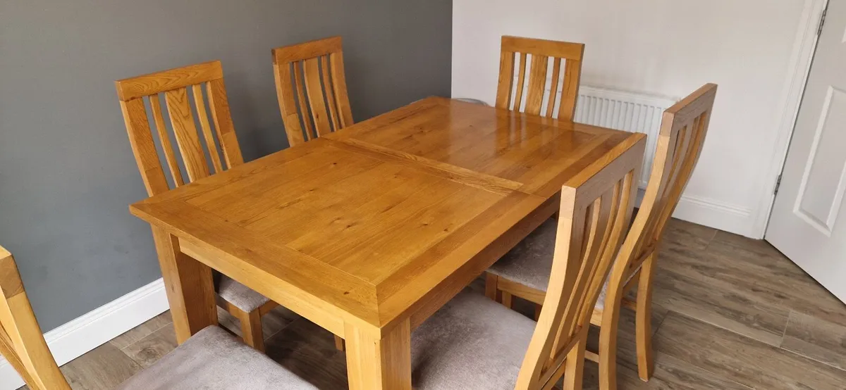 Solid oak extendable kitchen table and chairs - Image 2