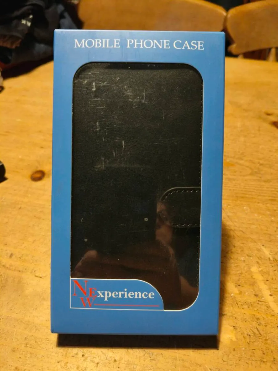 Mobile leather Black phone cover, New in Box.
For - Image 1