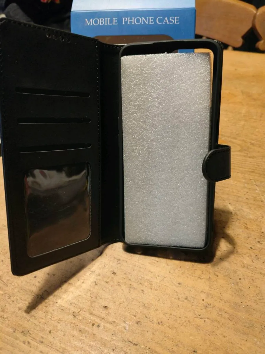 Mobile leather Black phone cover, New in Box.
For - Image 4