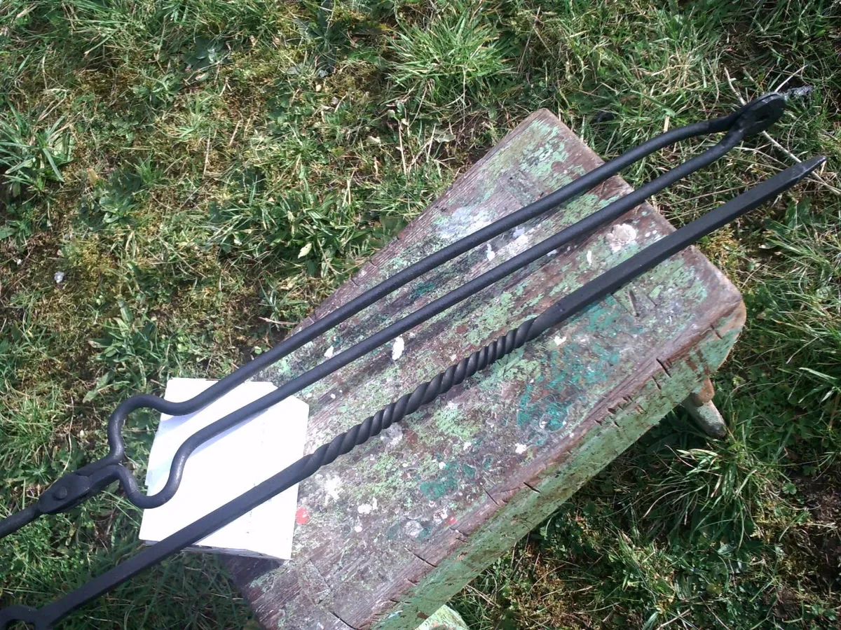 vintage fire tongs and poker