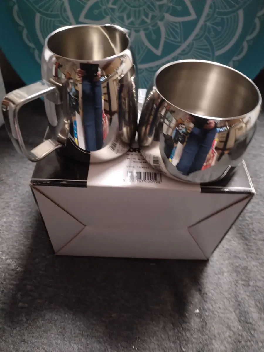 Milk jug and sugar bowl