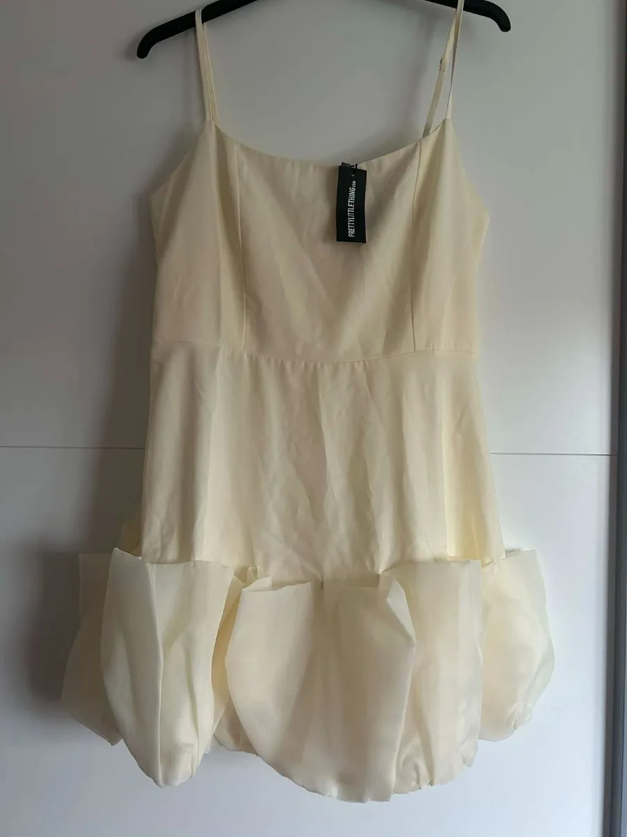 Earrings new and 2dresses - Image 2