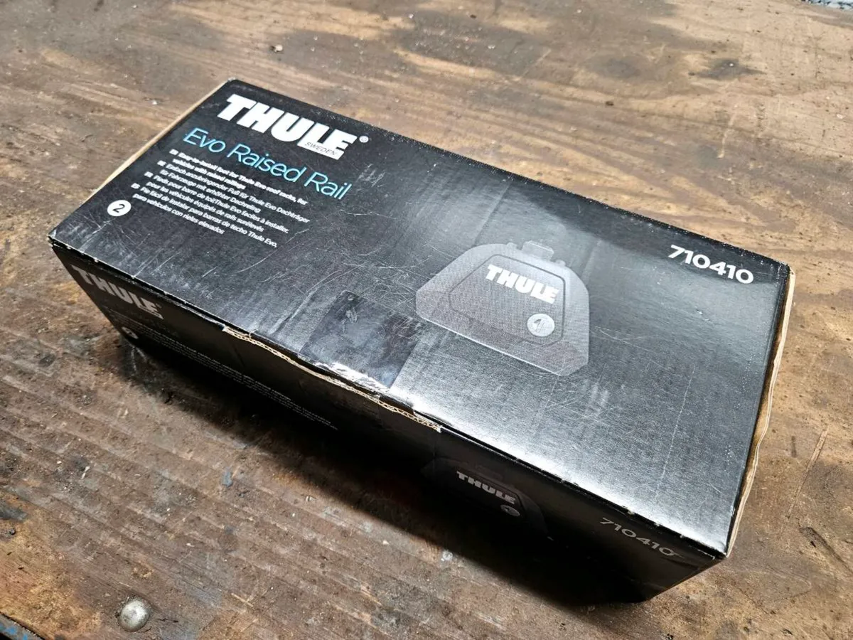 Thule roof bars mounting kit for raised roof rails - Image 1