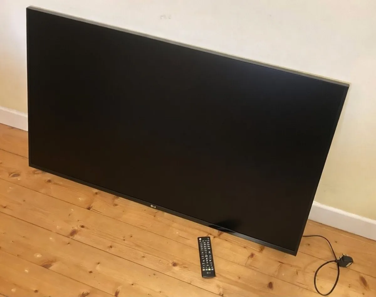 LG 49” Full HD Smart LED TV + Remote Control - Image 1