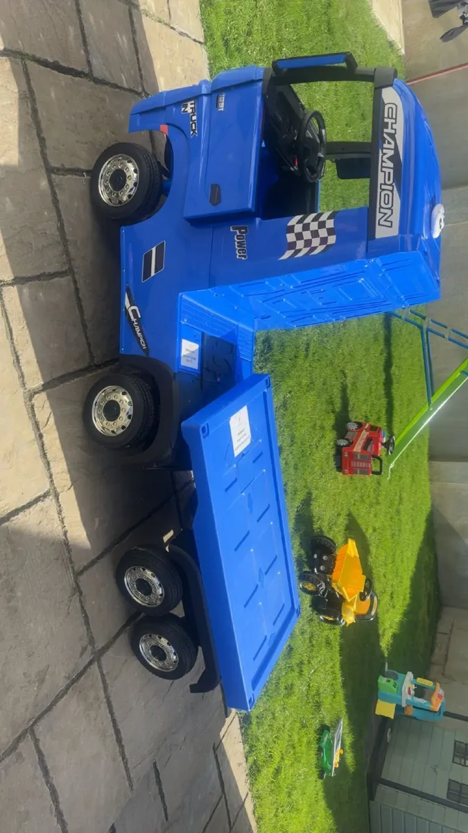 Battery operated toy truck and trailer. - Image 1