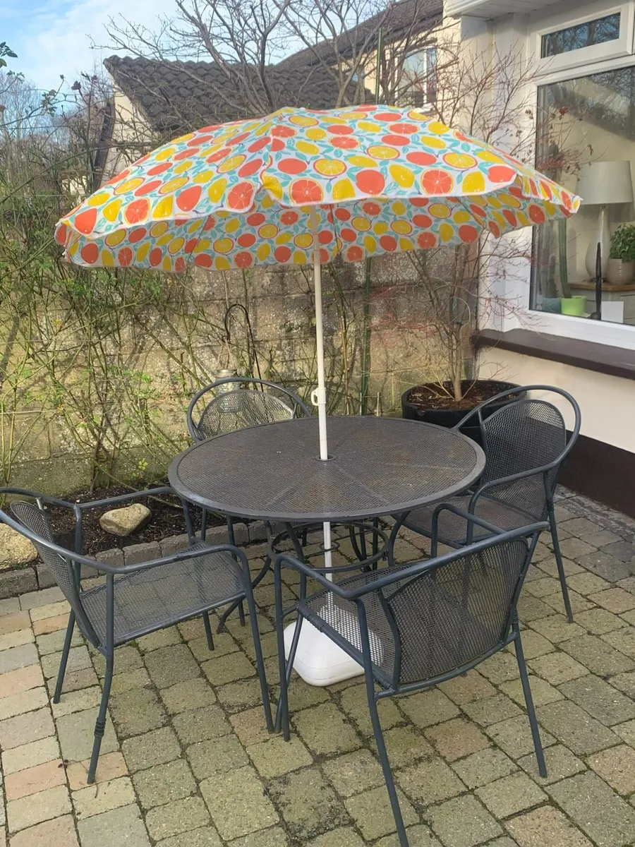 Patio table and 4 chairs - Image 1