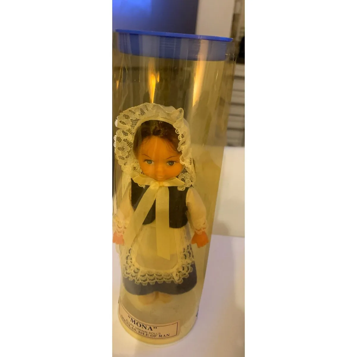 Vintage collection folk doll identified as Mona