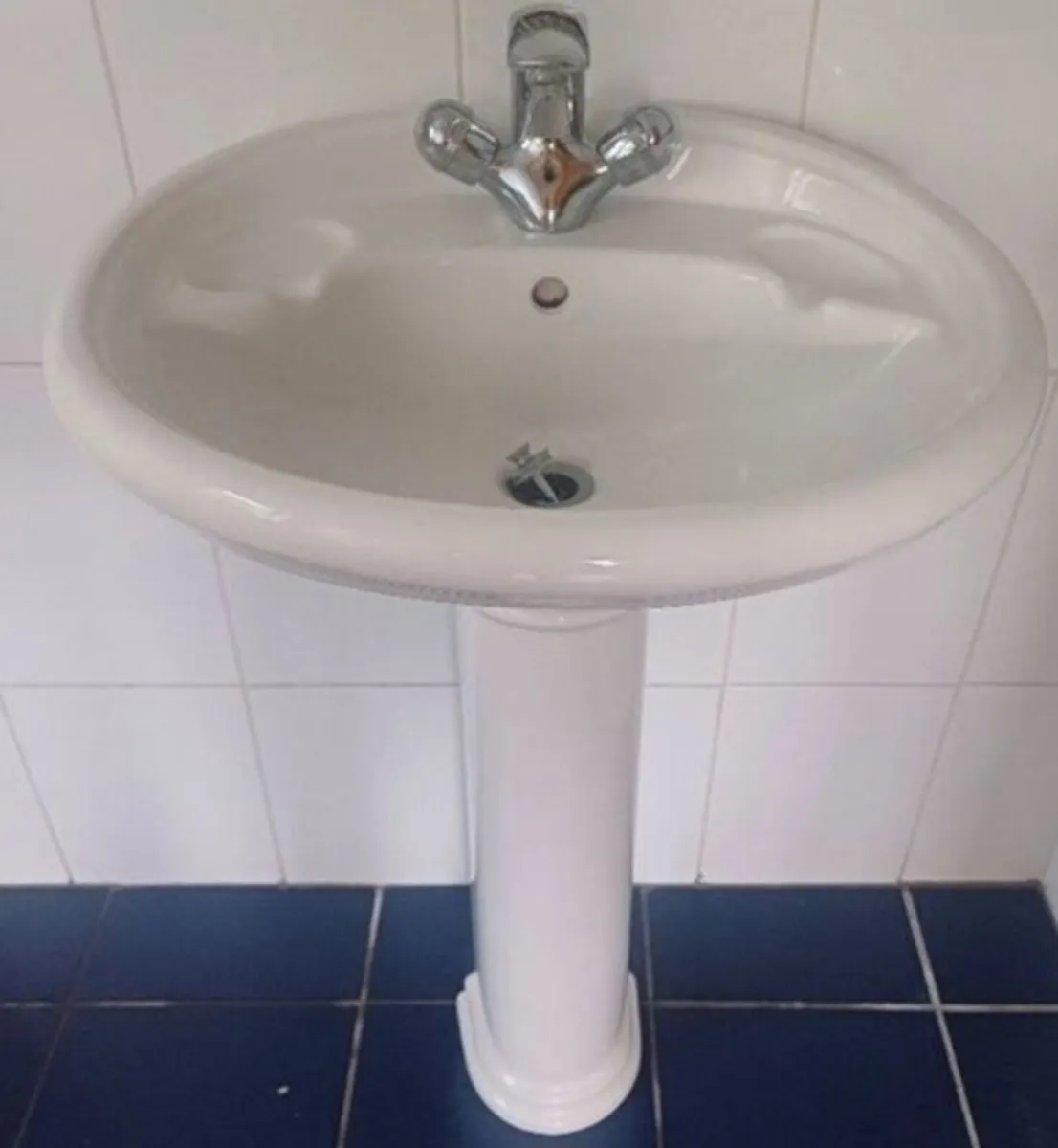 Sink, taps and pedestal