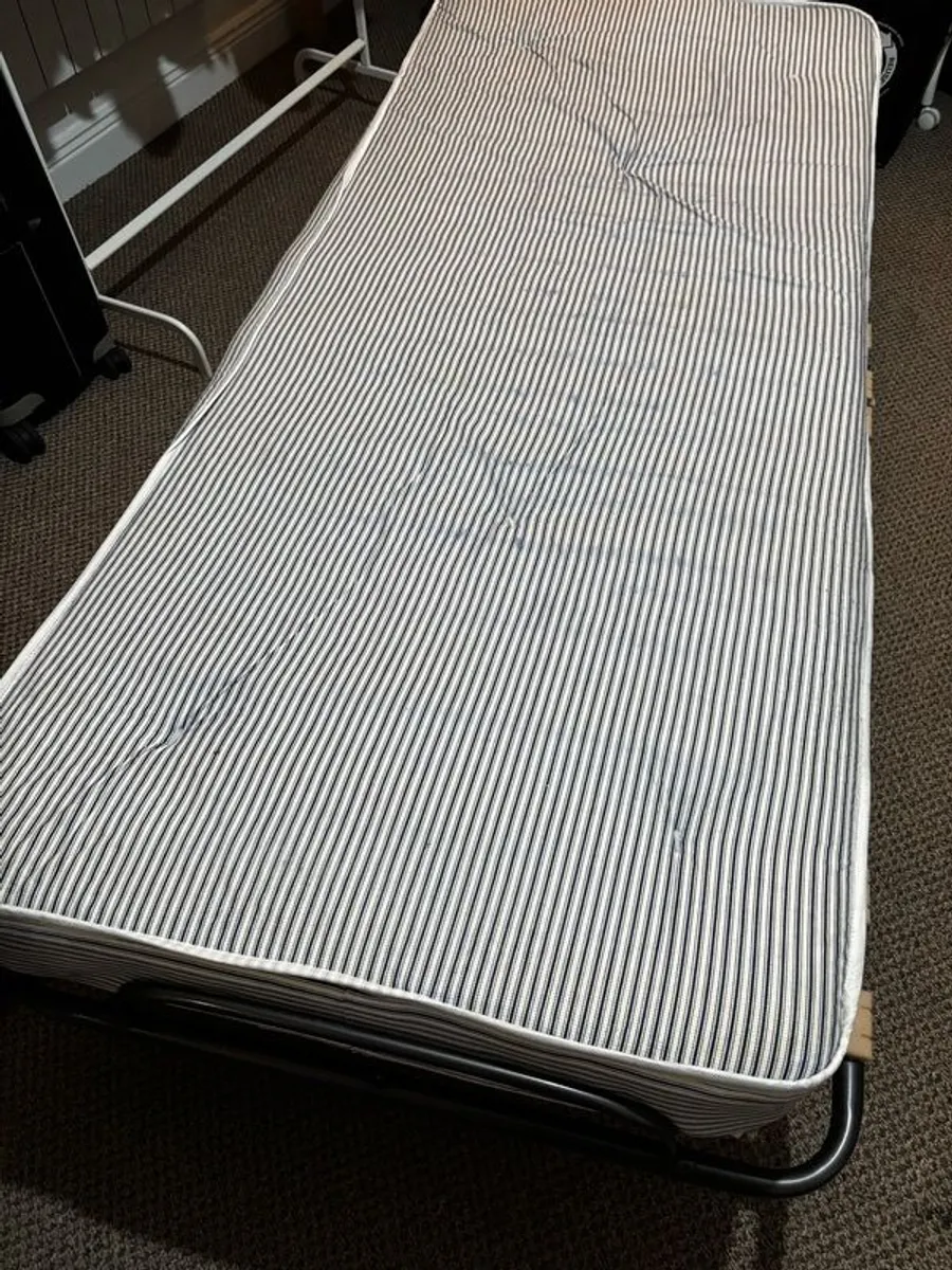 Foldable Single bed with wheels - Image 4