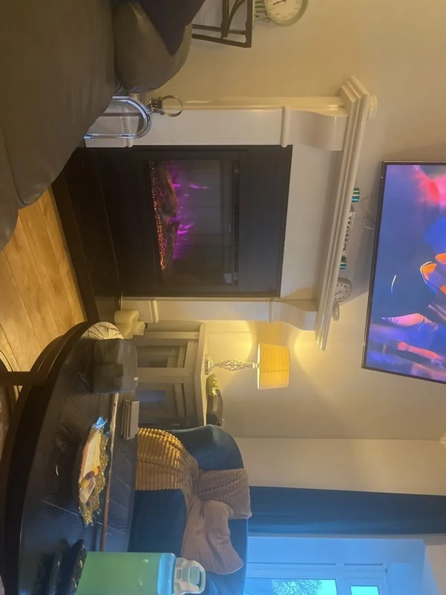 white marble fire surround black base and electric heater inset - Image 2