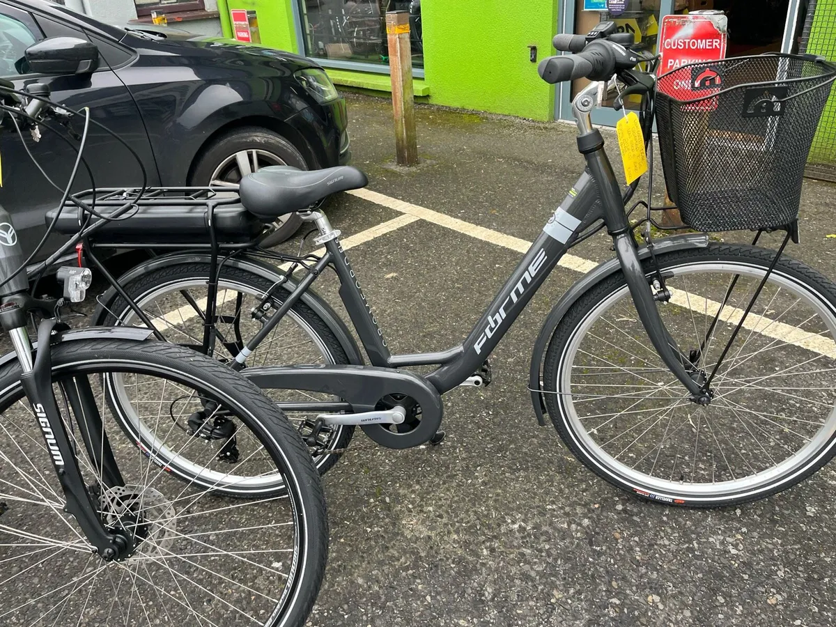 His and Hers E Bikes NEW - Image 3