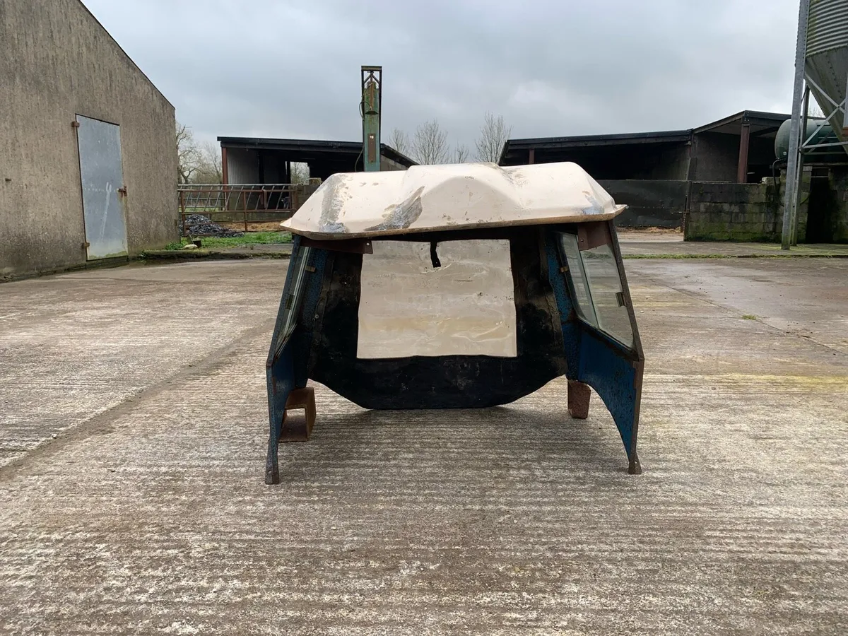 Ford Super Dexta tractor cab and tyre - Image 1